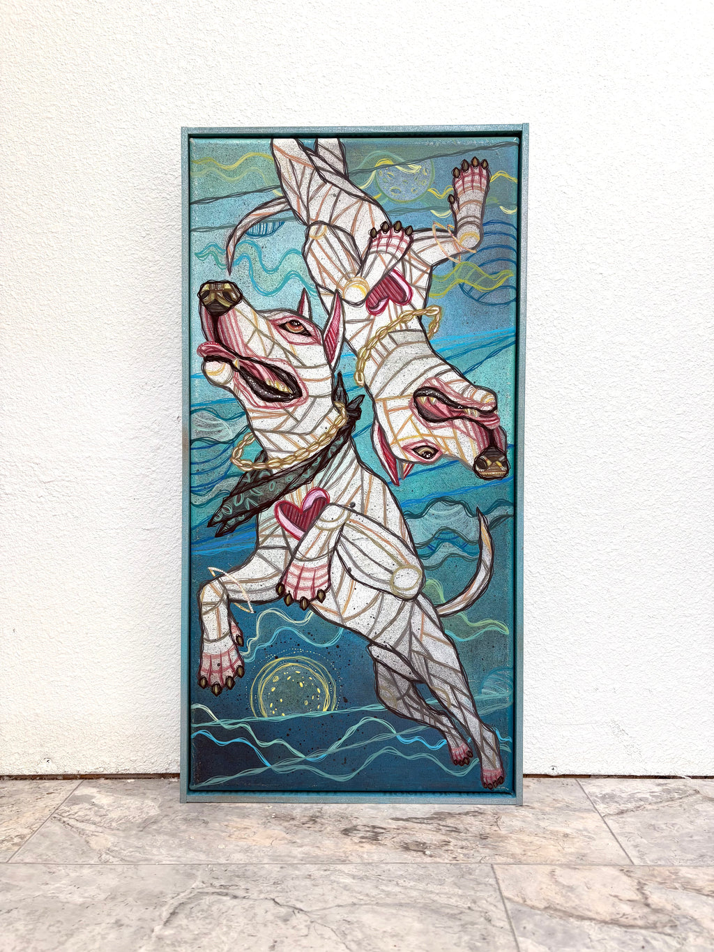 Decorative artist painting with a stylized dog design on a gallery wall by ash lethal