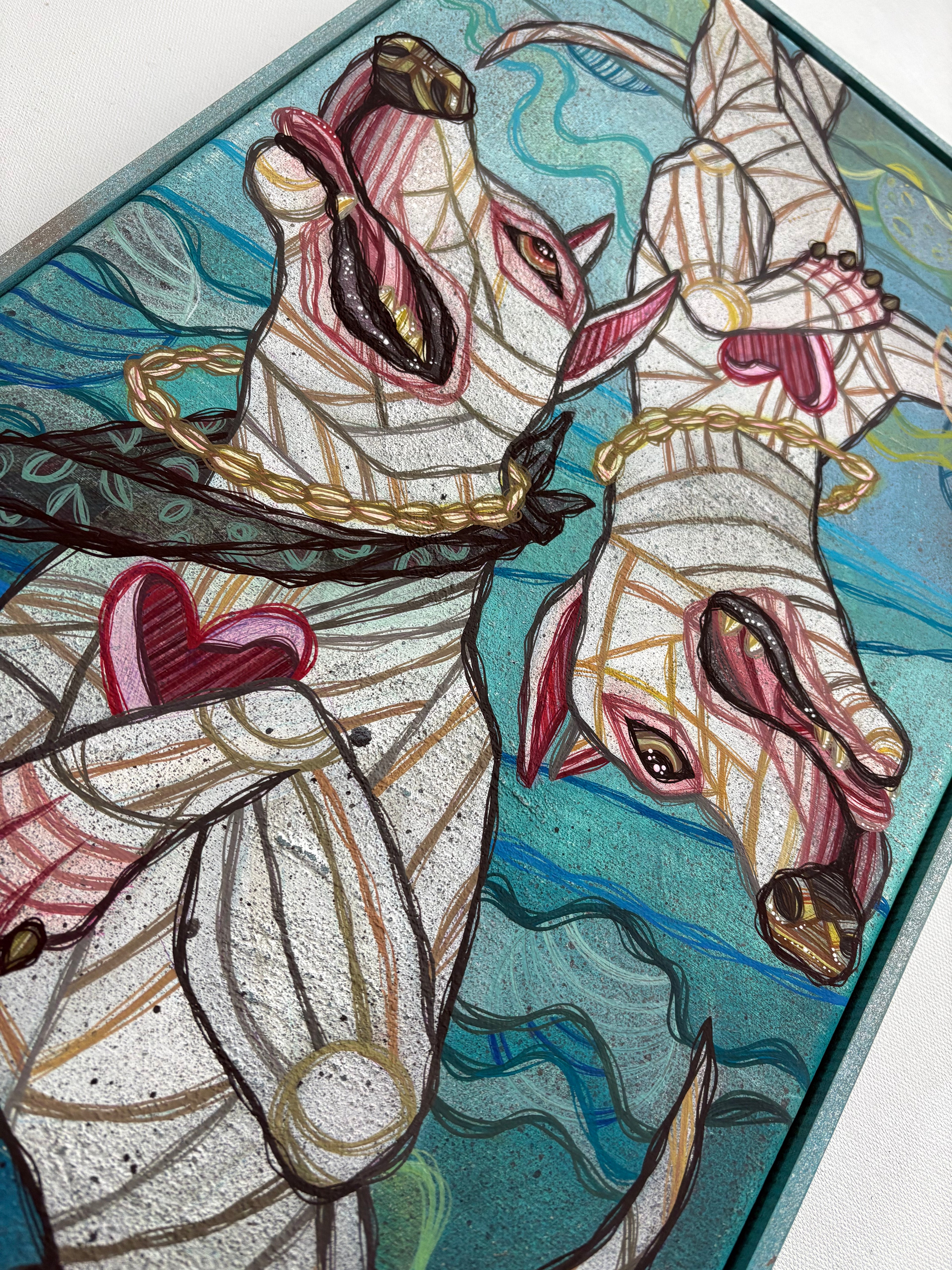 Stained glass artwork of two white dogs with a blue and green background