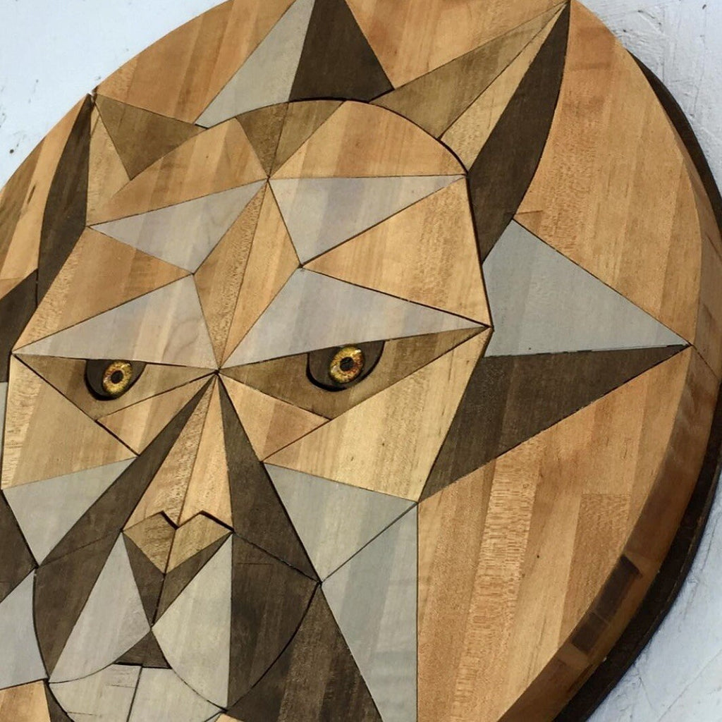 Wooden Handmade Wood art with geometric pattern resembling a lion big cat face 