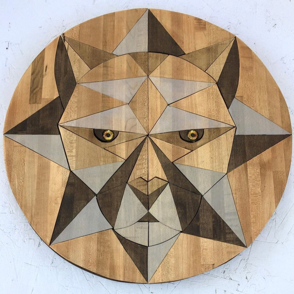 Wooden circular Butcher block wood art with geometric lion face design on a white gallery walla background by artist SS Design