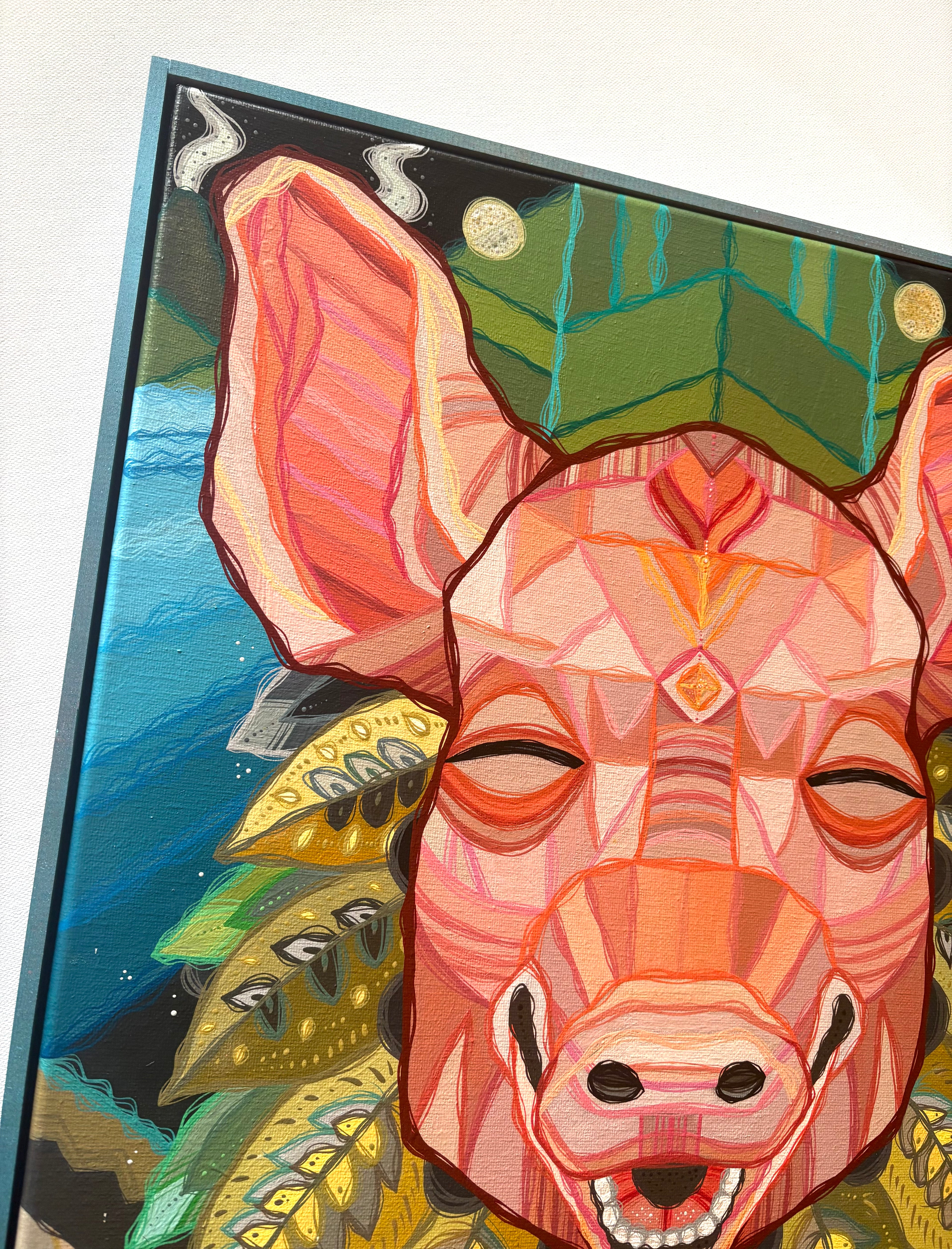 Colorful illustration of a pig's face with abstract patterns and geometric shapes.