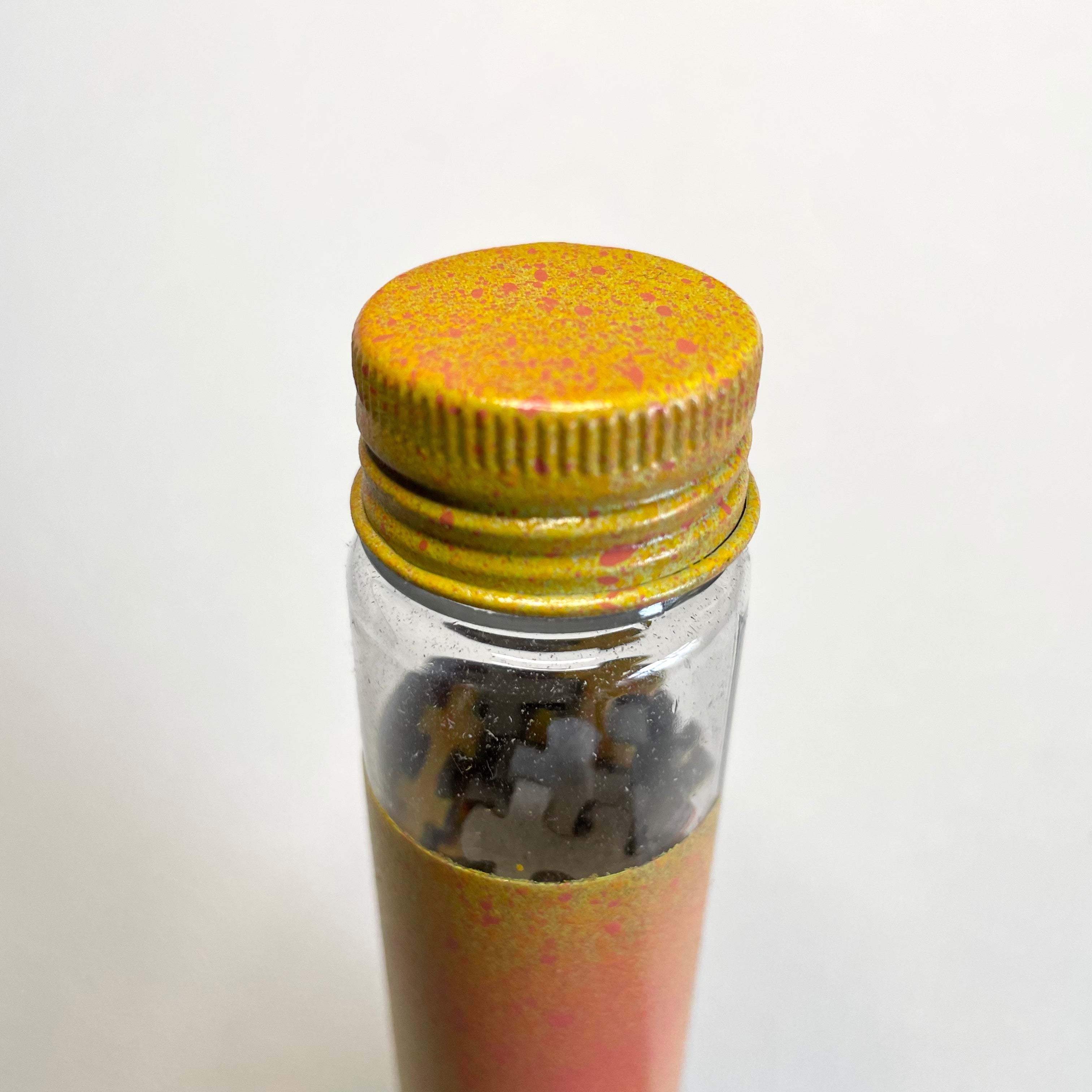 hand painted artist puzzle in matching tube by ash lethal