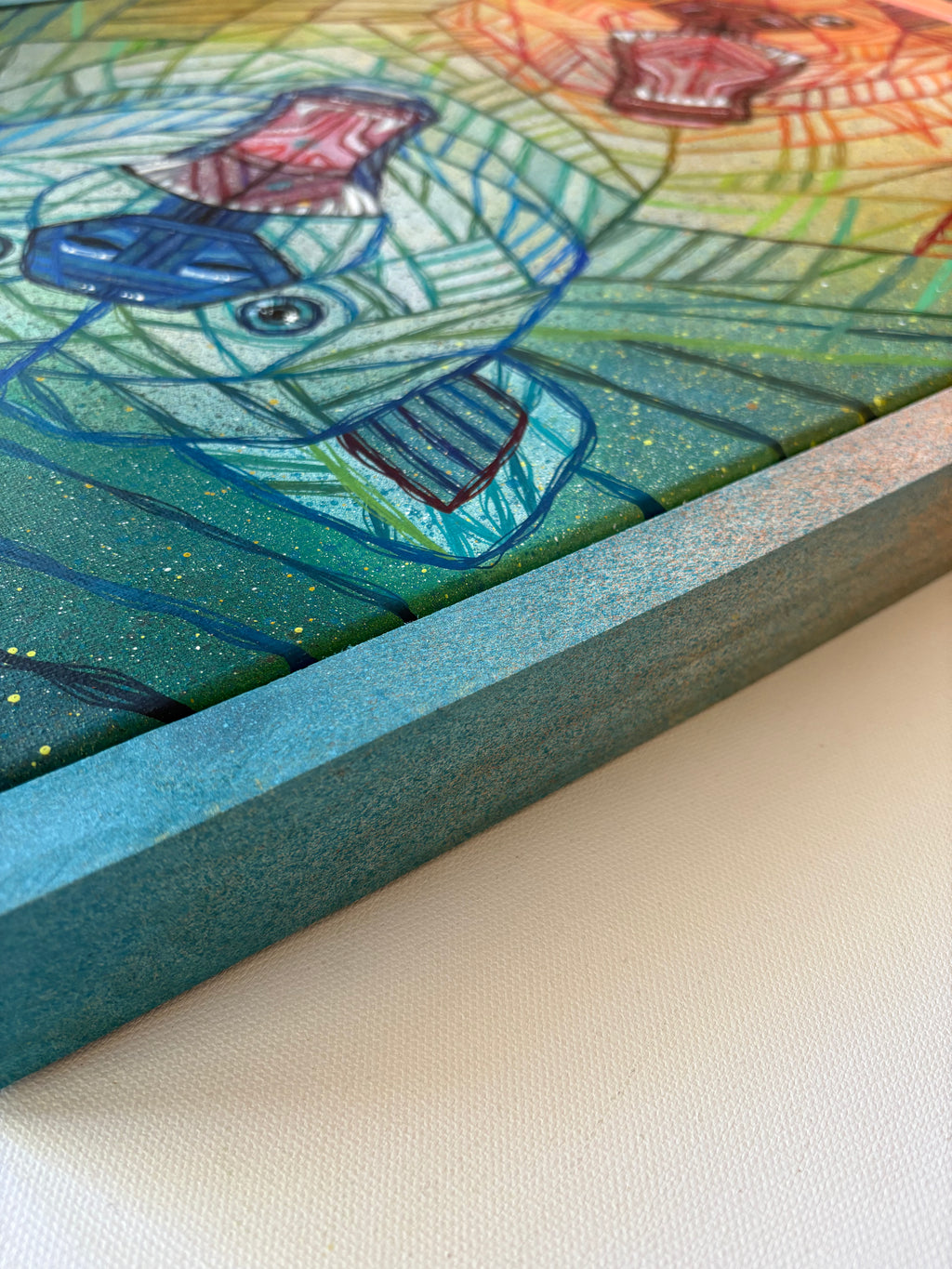 Colorful abstract wildlife bear painting with a blue frame 