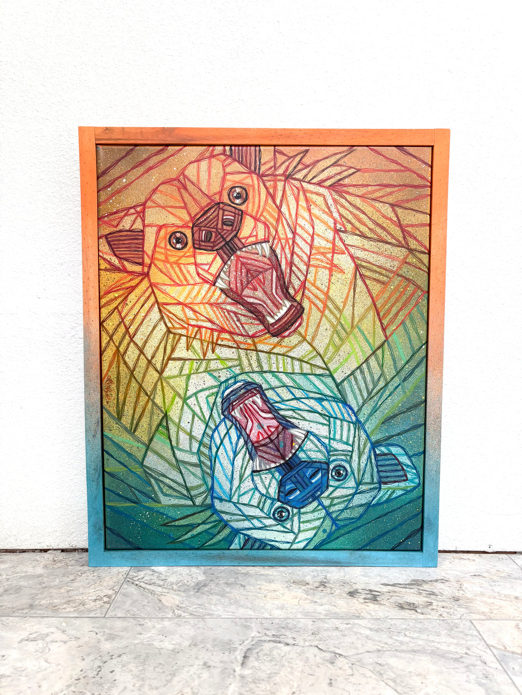 Colorful wildlife bears abstract artwork with geometric shapes on a white gallery wall