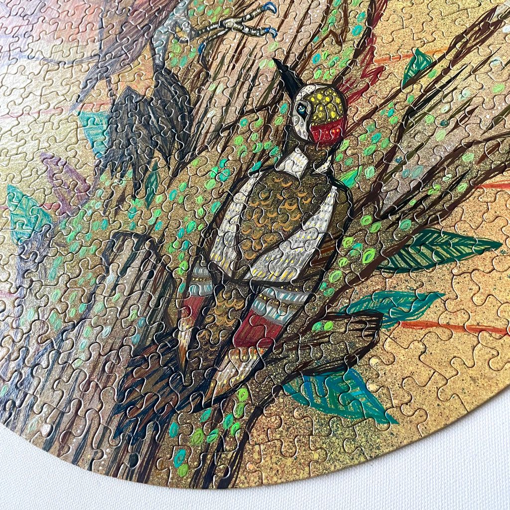 Jigsaw puzzle with a bird design on a branch