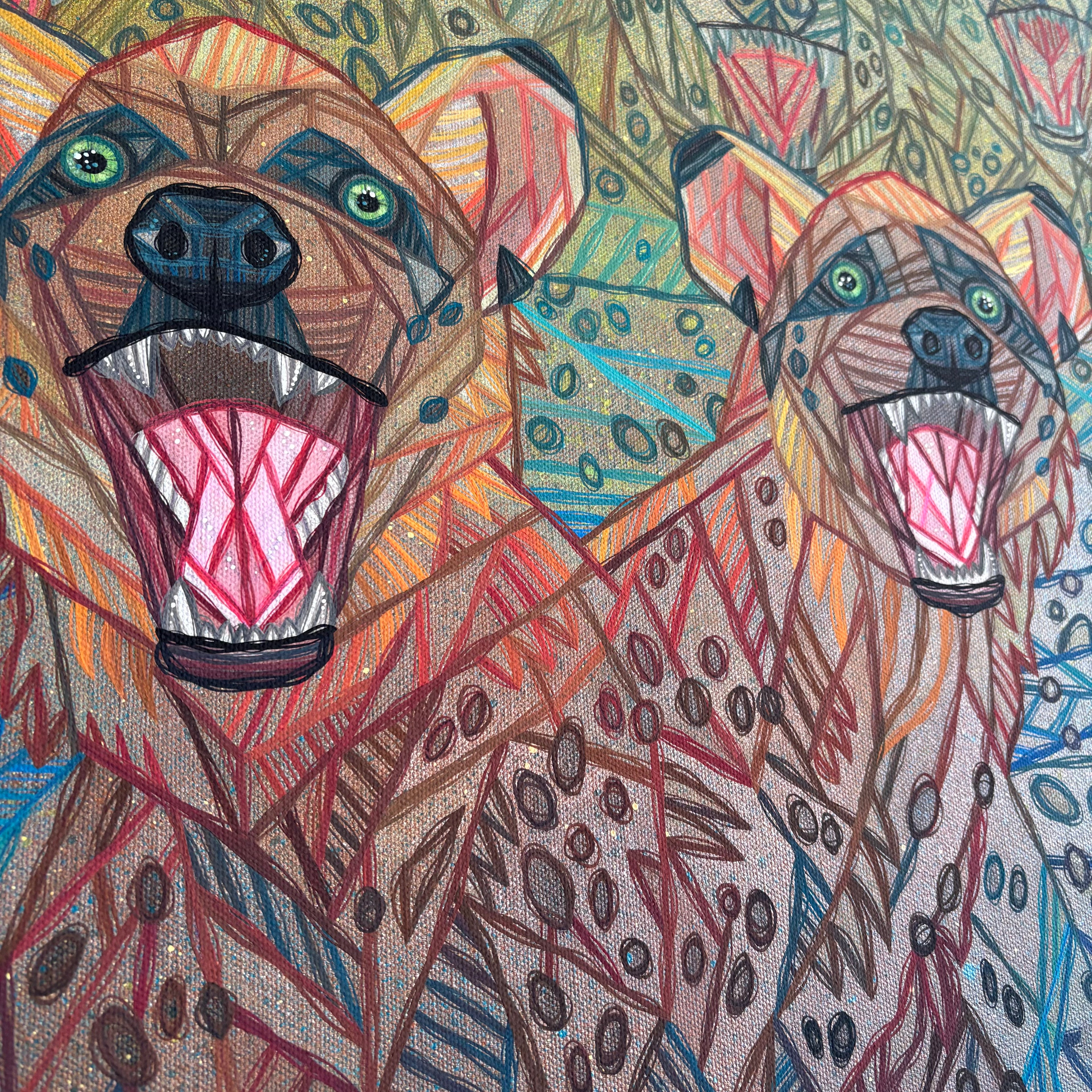 Colorful illustration of two wild dog hyenas roaring against a patterned background
