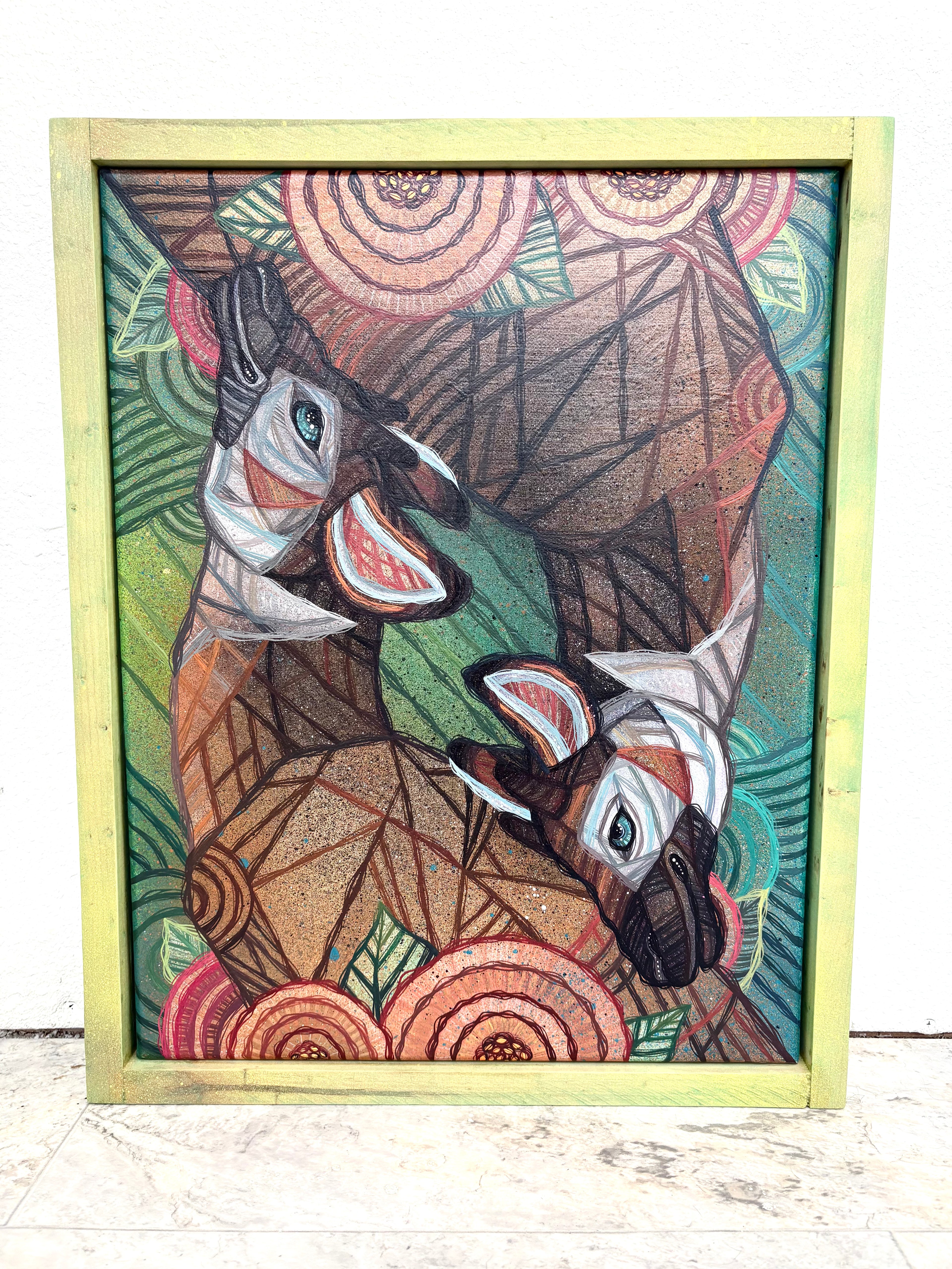 Geometric abstract art of two okapi animals in a wooden frame