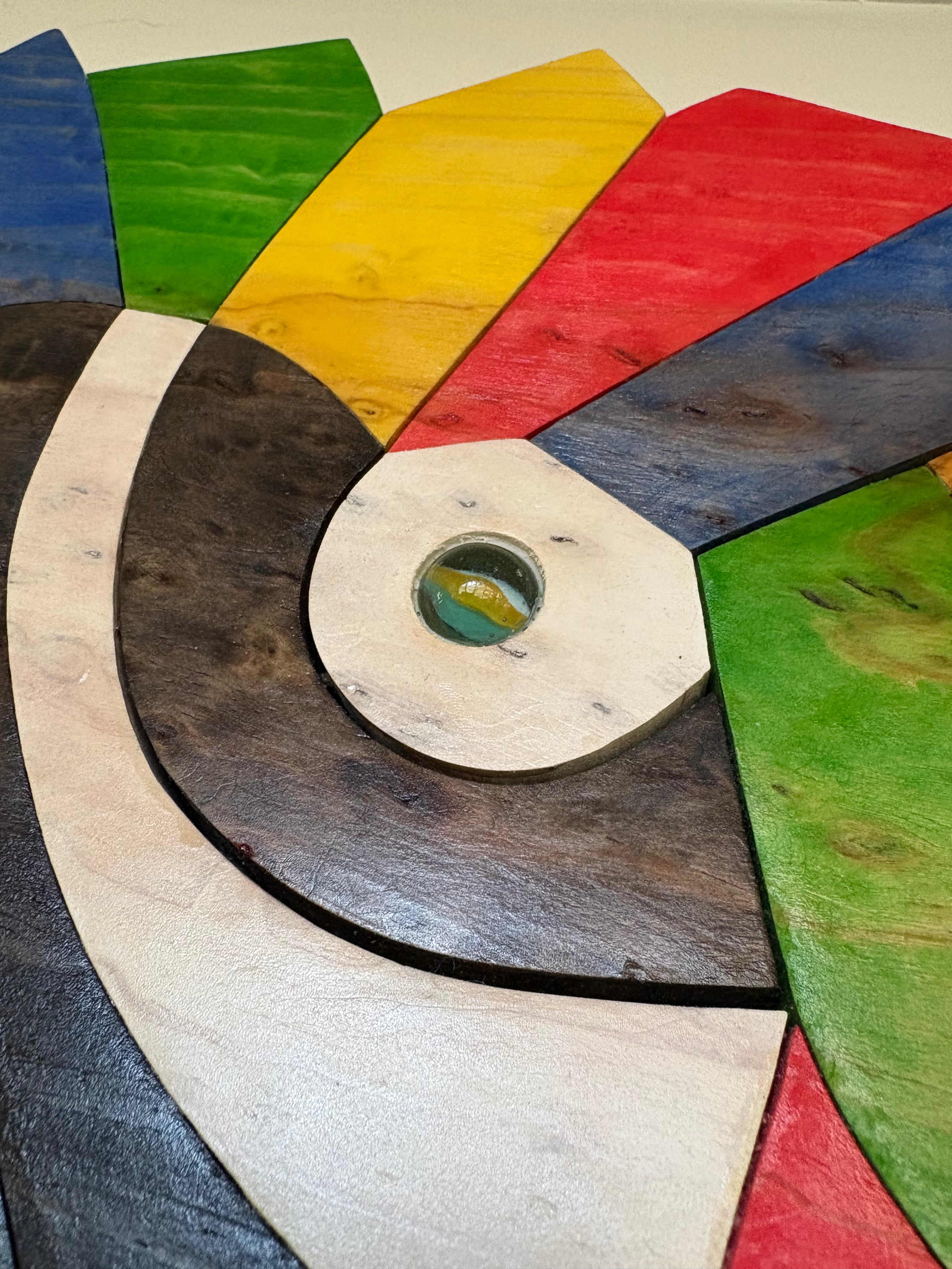 Colorful geometric wooden details of Macaw Bird Wood Art sculpture by SSDesign artist

