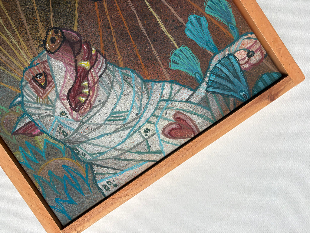 Decorative mosaic artwork of a dog and flowers with a wooden frame on a white background
