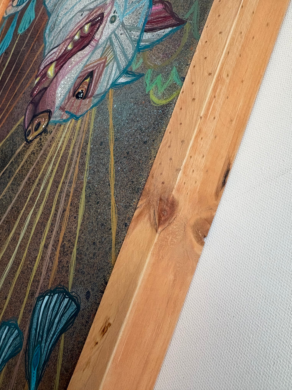 Close-up of a colorful dog  illustration on a textured surface with wooden frame by ash lethal
