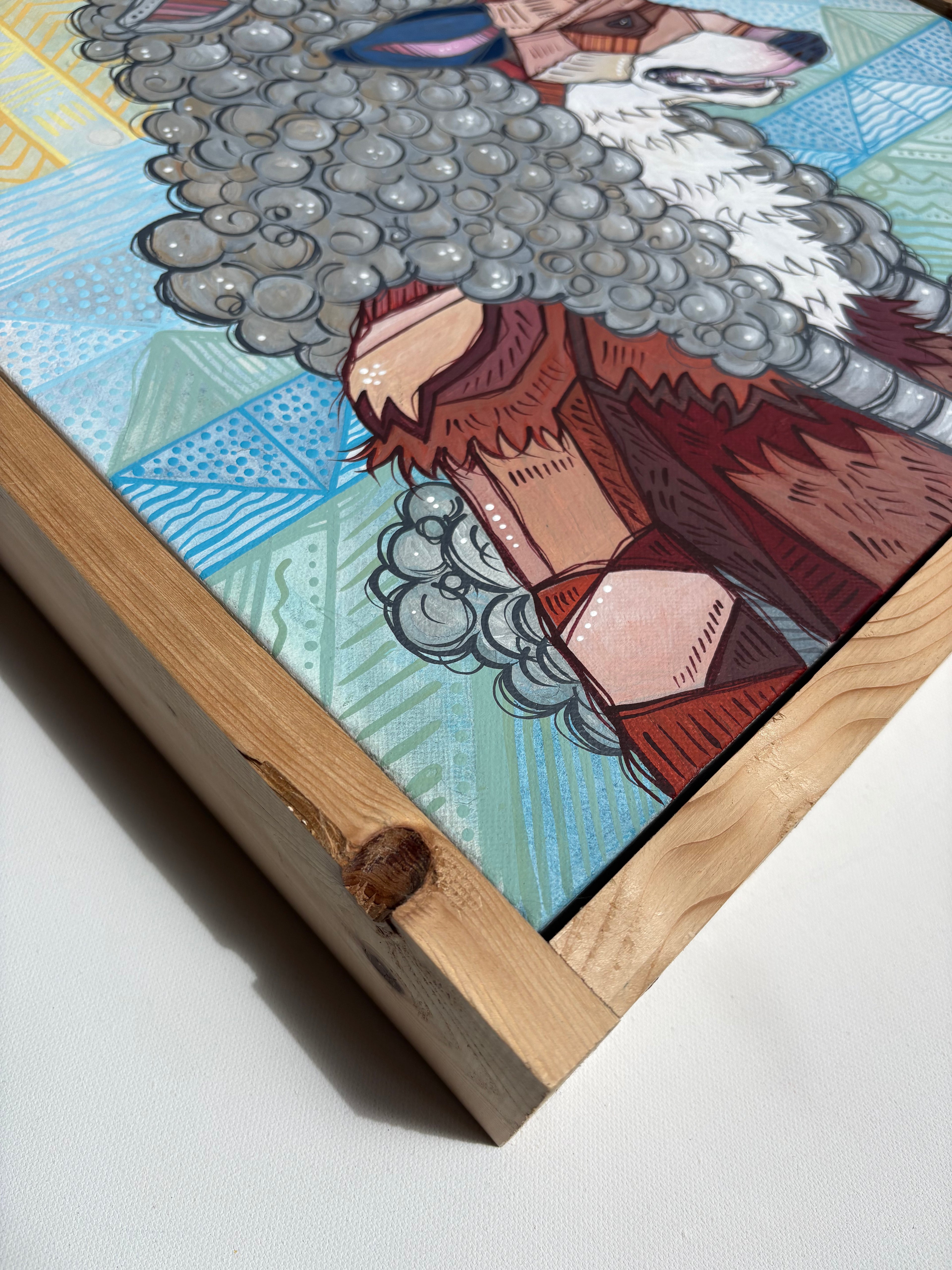 Close-up of a framed artwork with a colorful abstract design on a white background