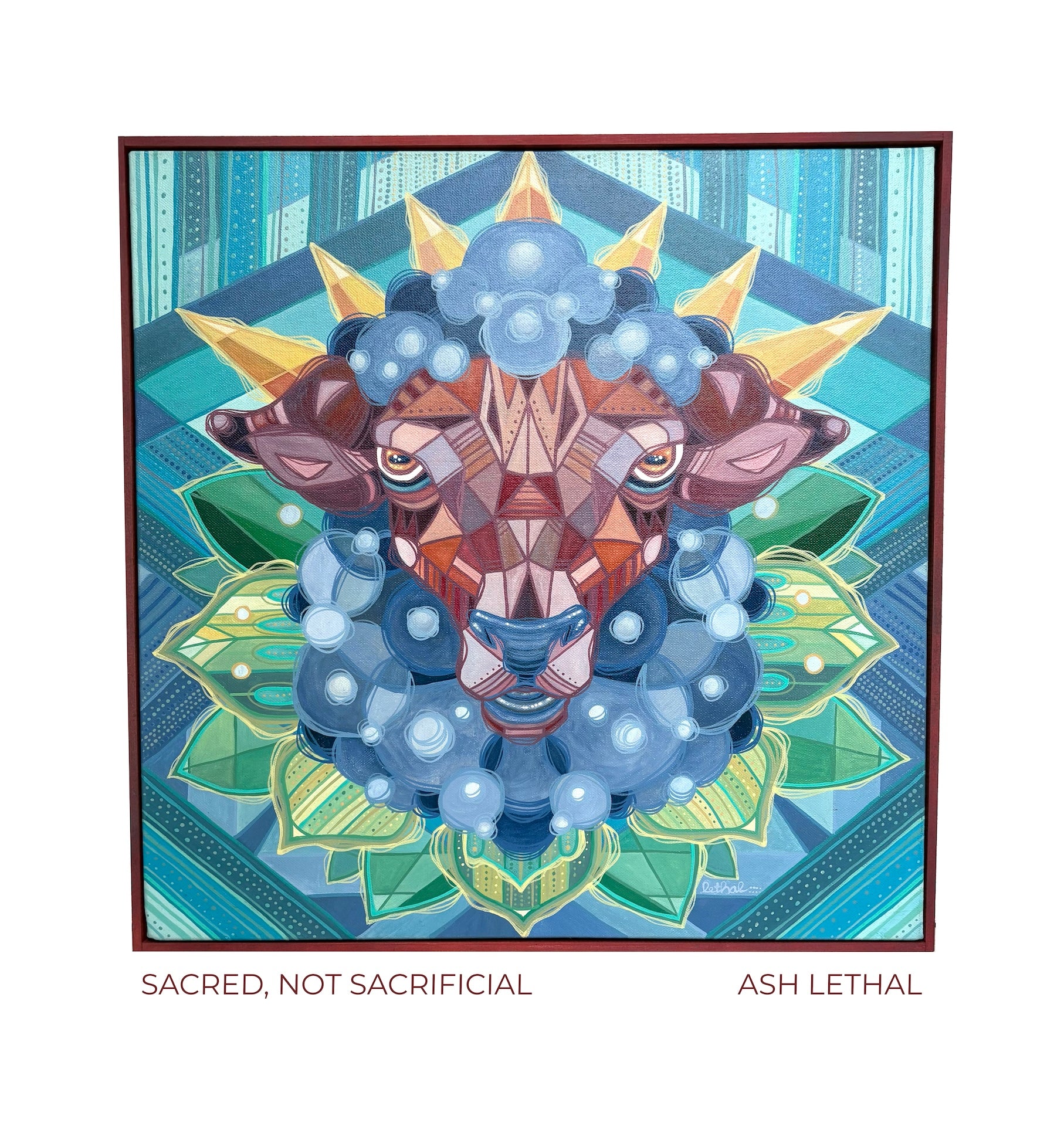 Colorful abstract art of a deer lamb sheep  head with geometric patterns on a blue and green background, featuring the text 'Sacred, Not Sacrificial' and 'Ash Lethal' painting by artist Ash Lethal Sacred Art