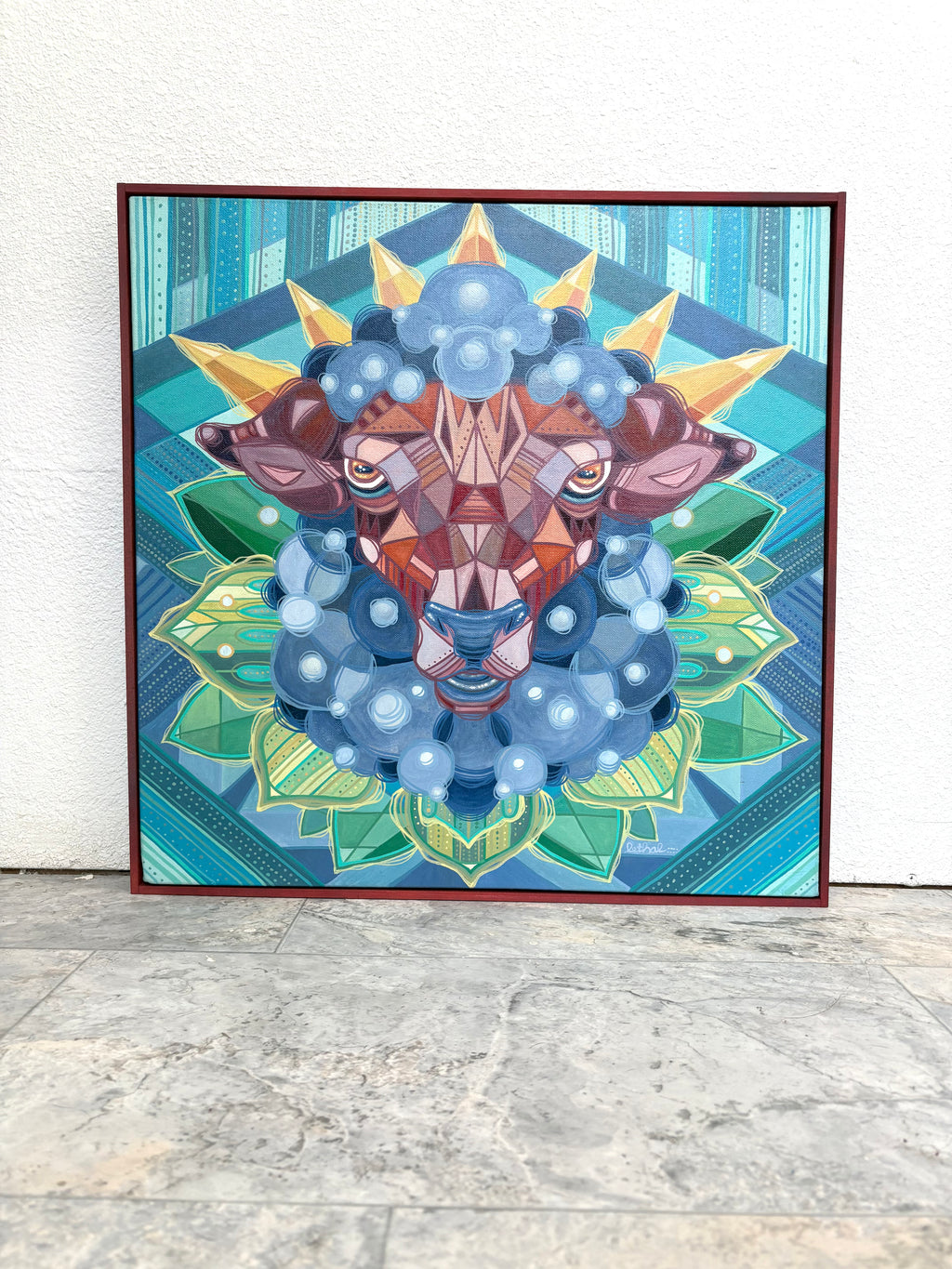 Colorful abstract art piece with geometric patterns on a textured surface of a sacred sheep lamb with gold crown by ash lethal