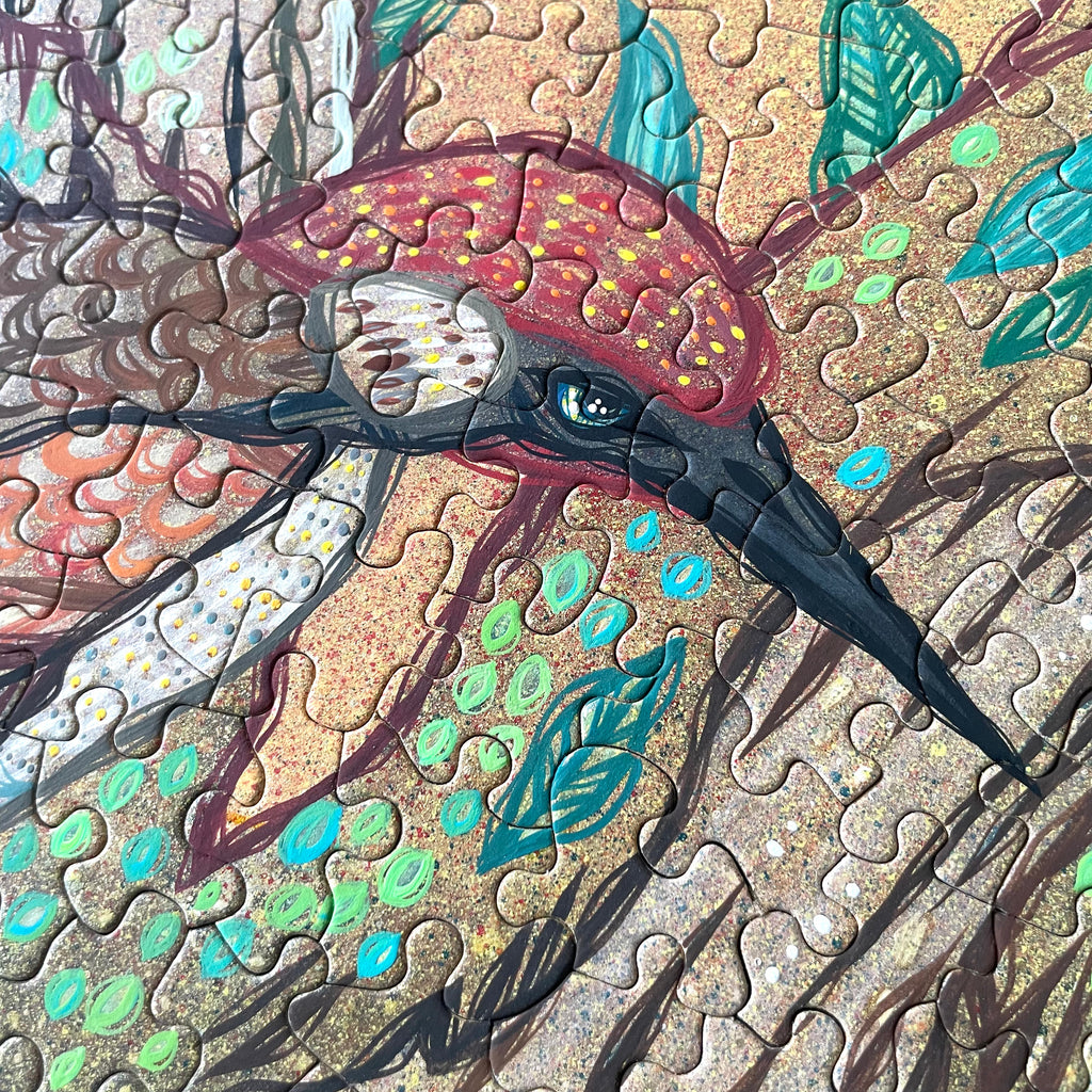 Colorful wild birds  illustration on a puzzle by artist Ash Lethal