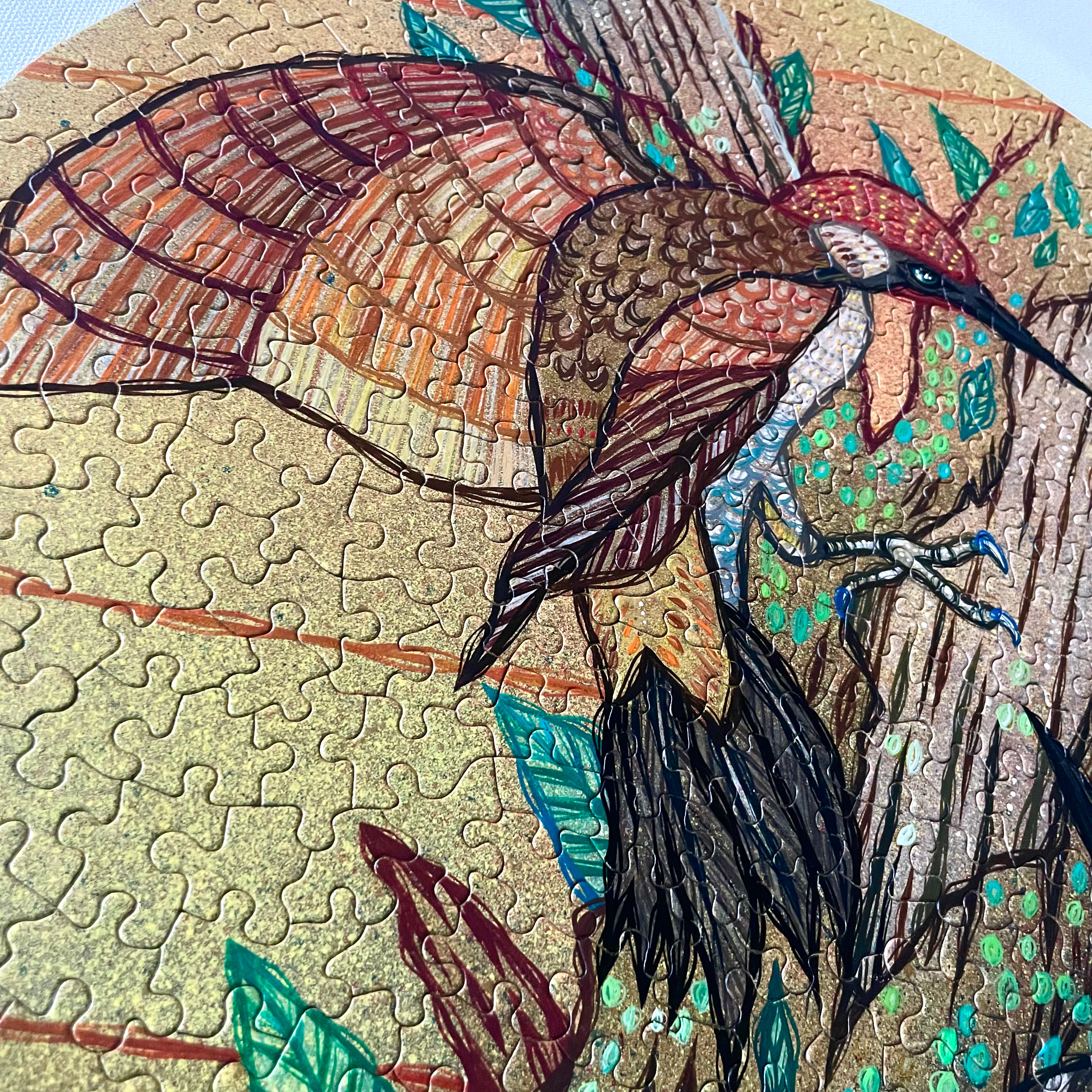 Close-up of a completed puzzle with a woodpecker bird design