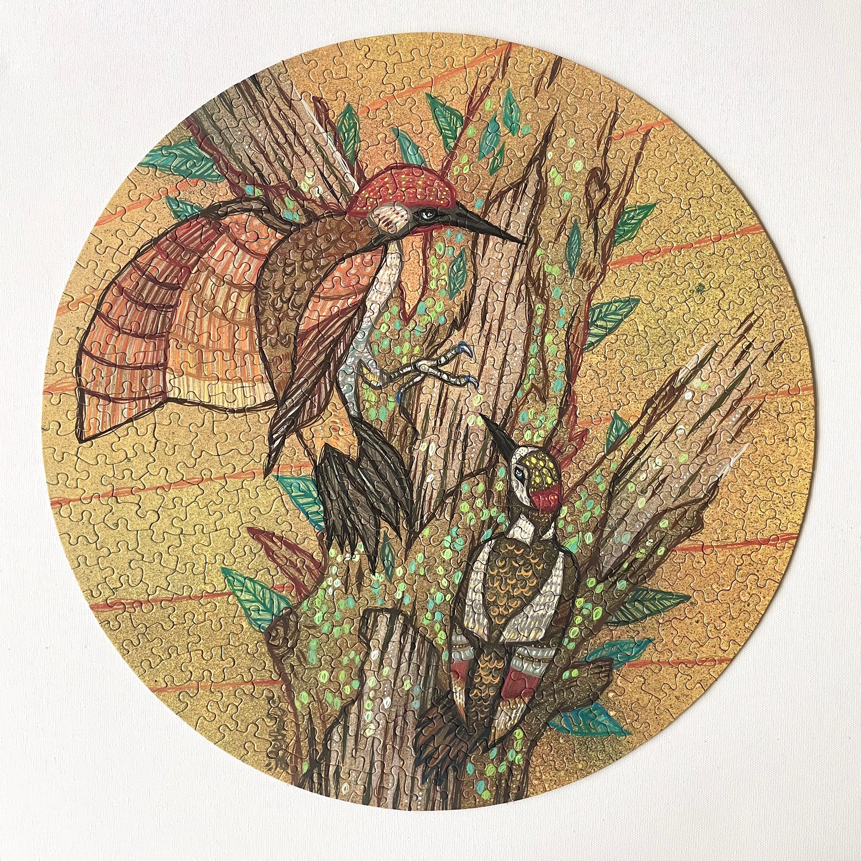 Round puzzle piece with illustration of two birds on a branch