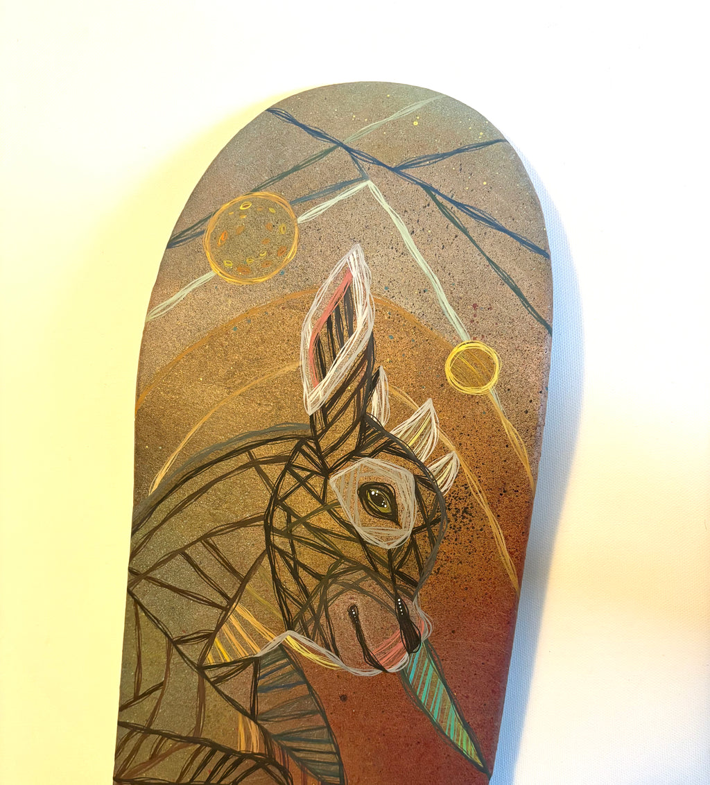 Skateboard deck with abstract design of a goat on a white background by ash lethal