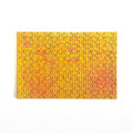 Jigsaw puzzle with a gradient of yellow to orange on a white background