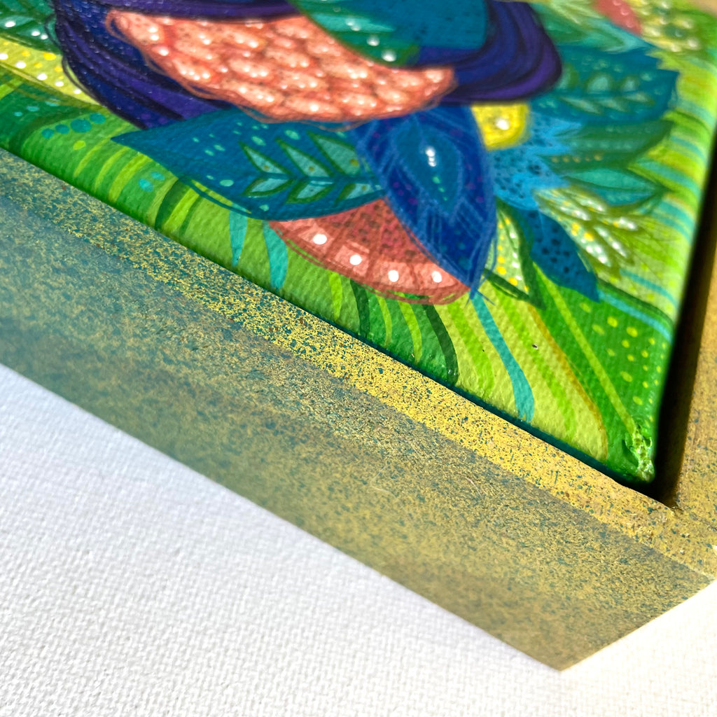Decorative art in frame with a colorful design on a white background