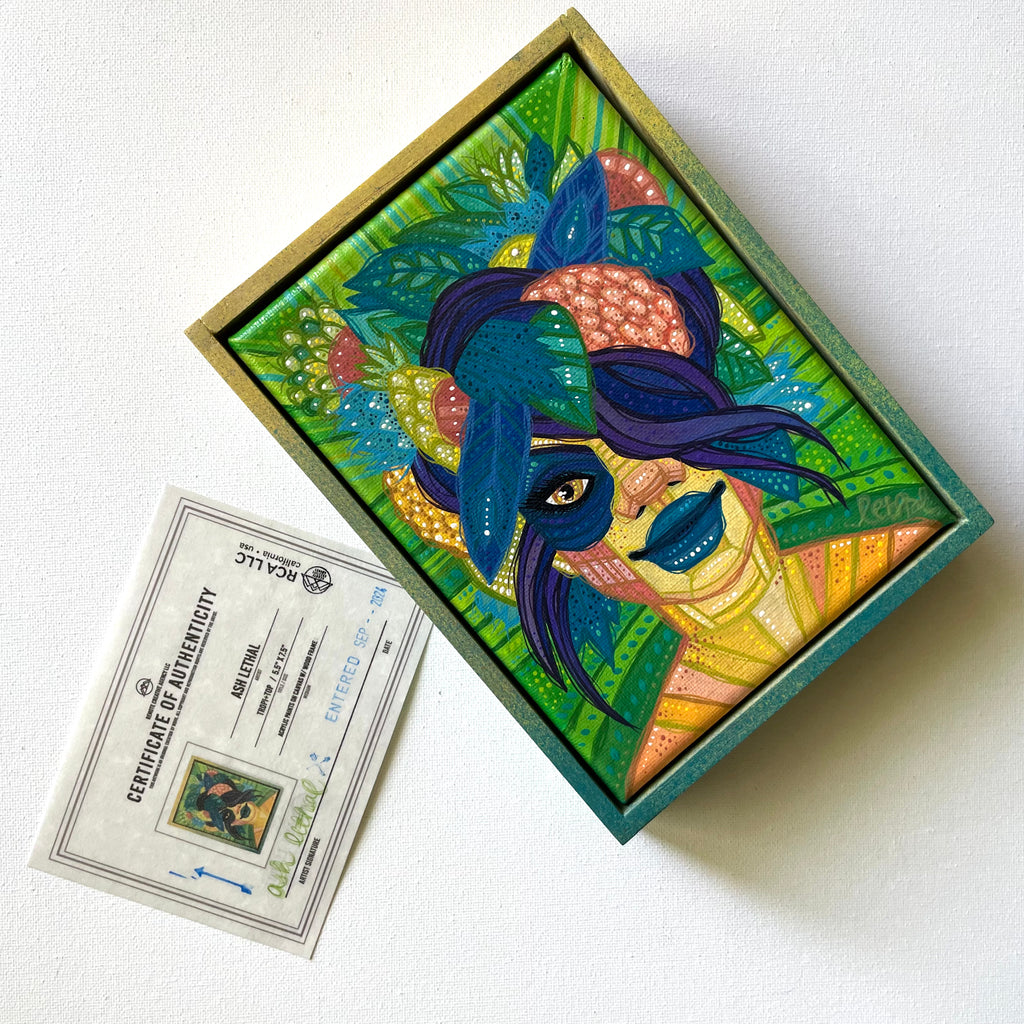 Decorative framed painting with artistic design and a certificate of authenticity on a white background